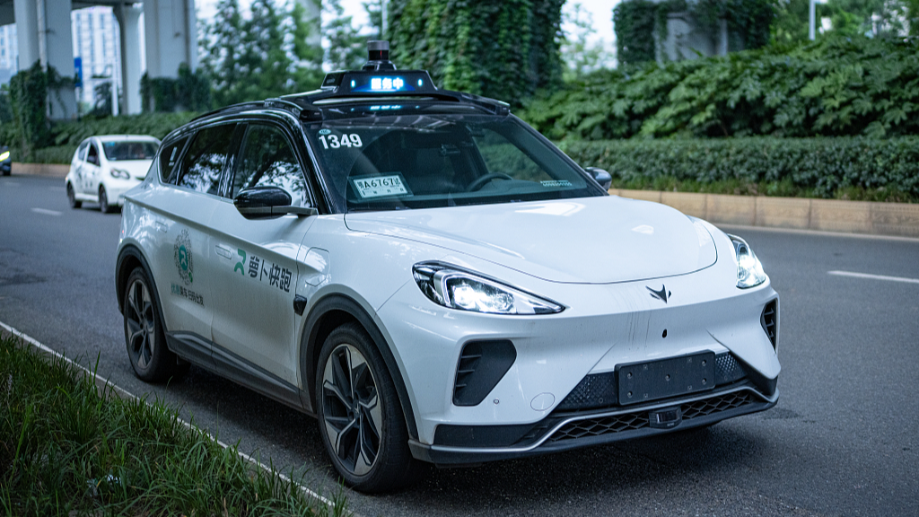 Baidu's robotaxi Apollo Go rides on a road of Wuhan, central China's Hubei Province