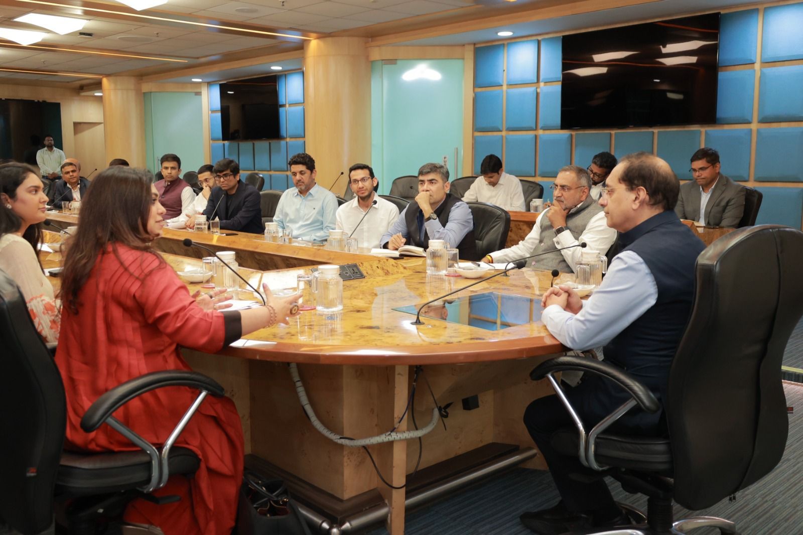 Government and startup ecosystem leaders engage in a policy roundtable discussion at a formal boardroom setting, highlighting India’s public-private collaboration on innovation and entrepreneurship.