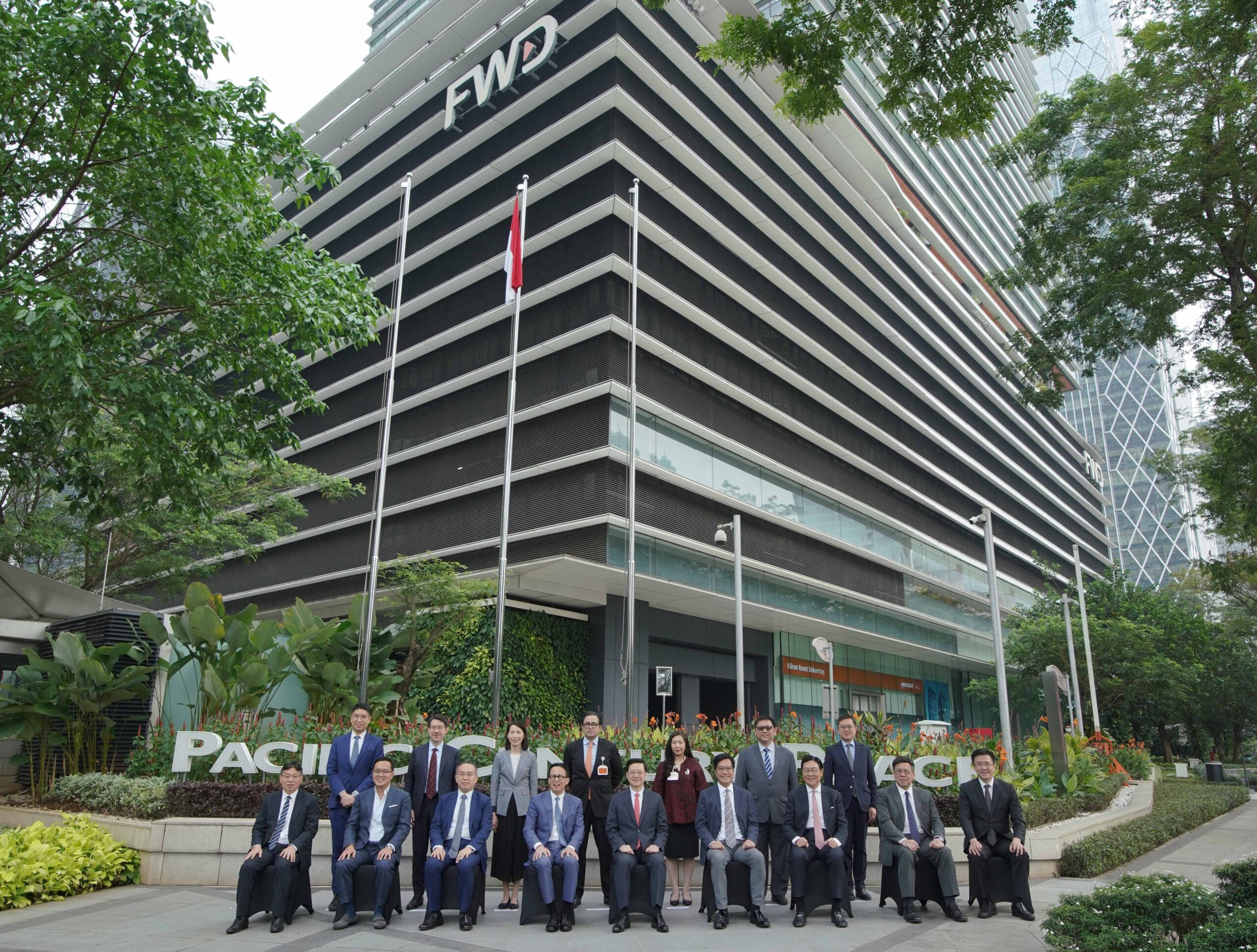 Group photo of business leaders in front of the FWD headquarters at Pacific Century Place, Jakarta, highlighting the insurance firm’s regional presence and corporate leadership in Asia.Group photo of business leaders in front of the FWD headquarters at Pacific Century Place, Jakarta, highlighting the insurance firm’s regional presence and corporate leadership in Asia.