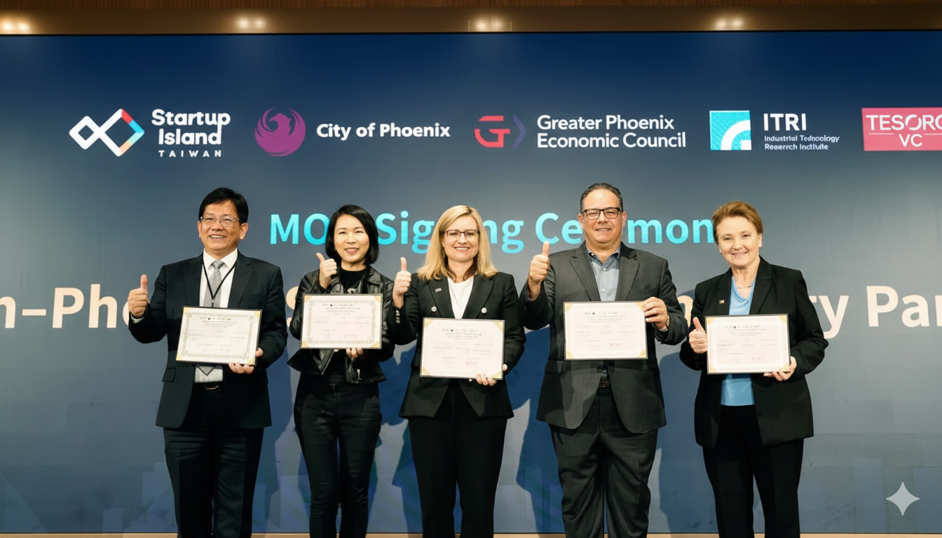 Representatives from Startup Island Taiwan, the City of Phoenix, and partner organizations pose with signed certificates at an MOU signing ceremony, highlighting cross-border startup collaboration and international innovation partnerships.