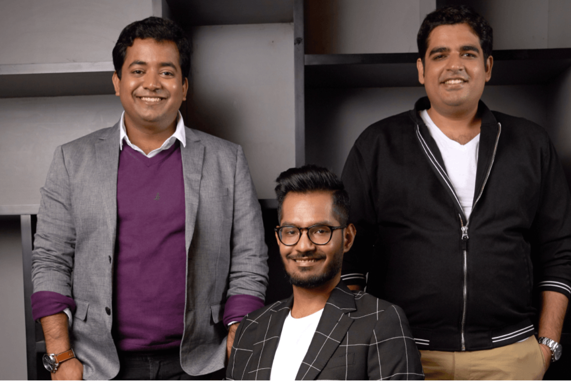 Startup founders posing for team portrait in modern office setting, highlighting Indian entrepreneurship and technology leadership.