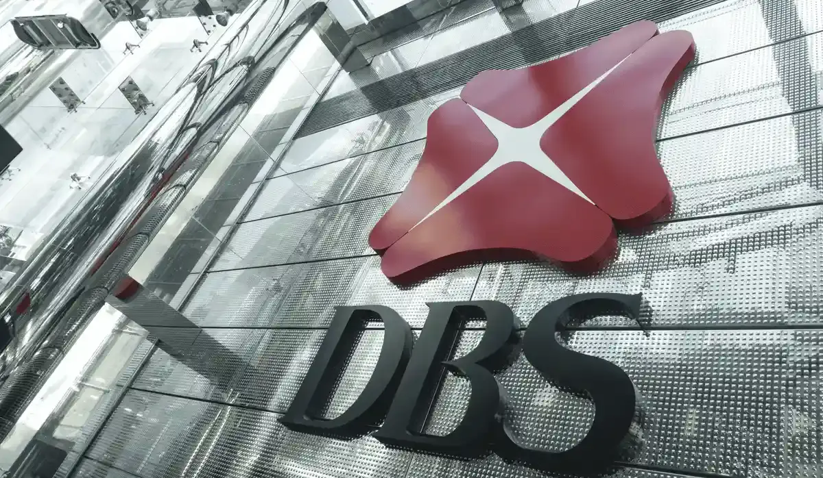 DBS Bank logo displayed on modern glass building facade, representing Singapore’s leading financial services institution.