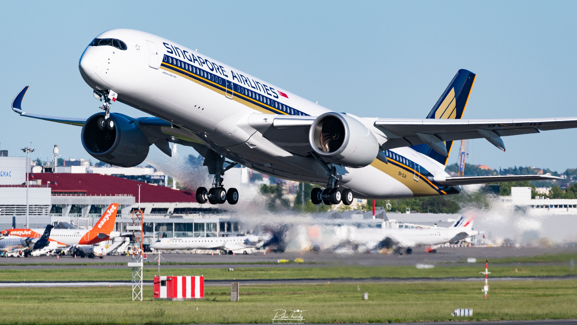 Singapore Airlines wide-body aircraft taking off from an international airport runway, showcasing the carrier’s premium livery, modern fleet, and global aviation operations.
