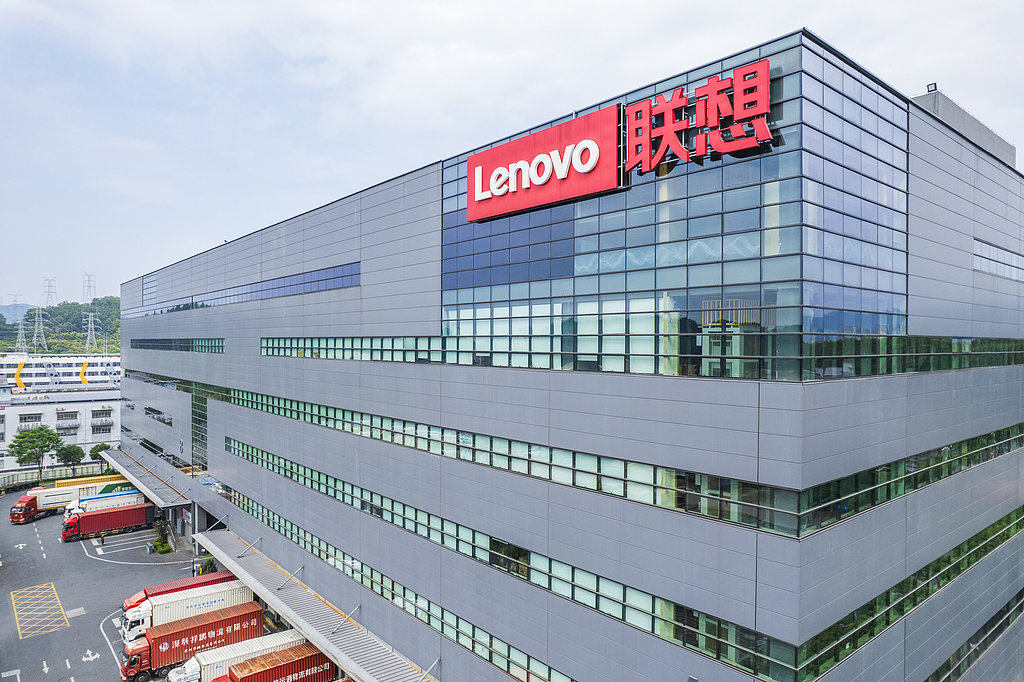 Lenovo headquarters building with prominent Lenovo logo signage on modern glass office façade in China.