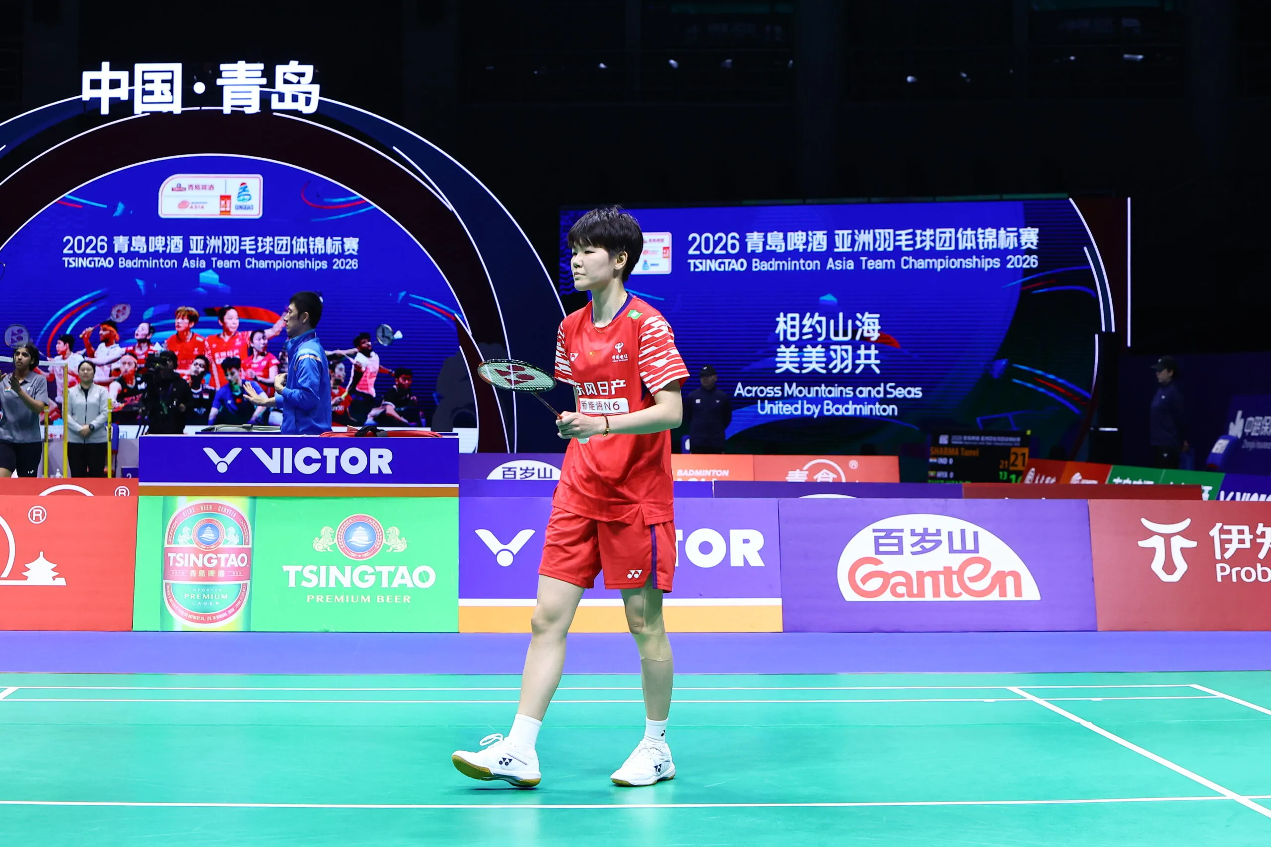 Badminton player competing at the Tsingtao Badminton Asia Team Championships 2026 in Qingdao, China, during an international team match on a professional indoor court.