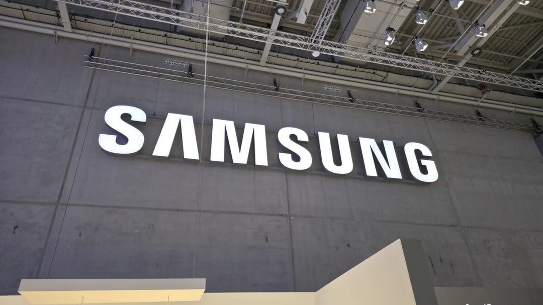Samsung logo displayed on large exhibition booth wall at global technology trade show.