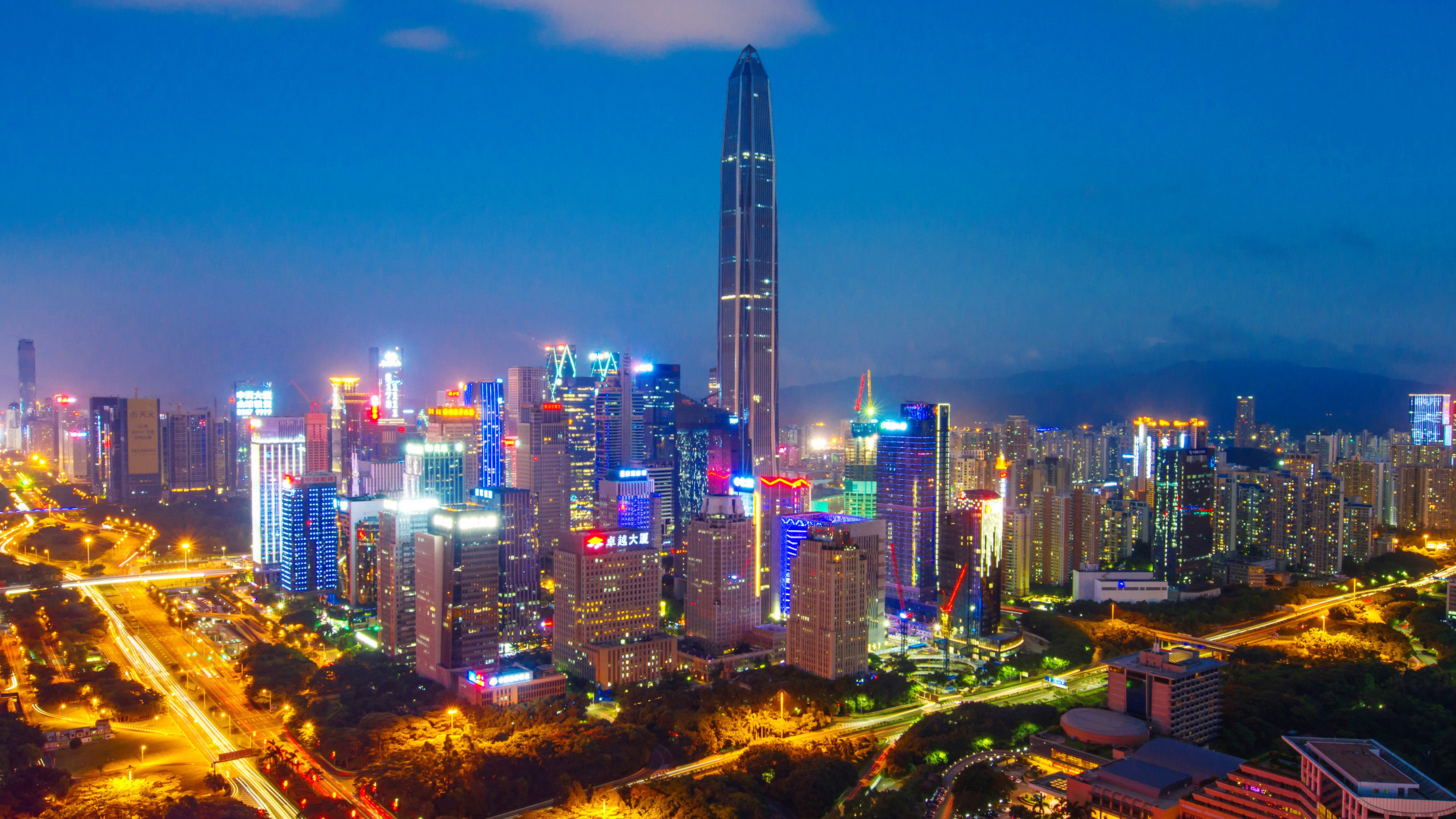 Shenzhen skyline at night featuring Ping An Finance Centre and illuminated skyscrapers, highlighting China’s modern financial and technology hub.