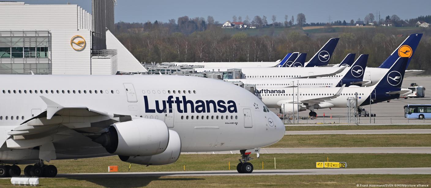 Lufthansa aircraft lined up at an airport maintenance and parking area, highlighting the airline’s fleet operations and aviation infrastructure.