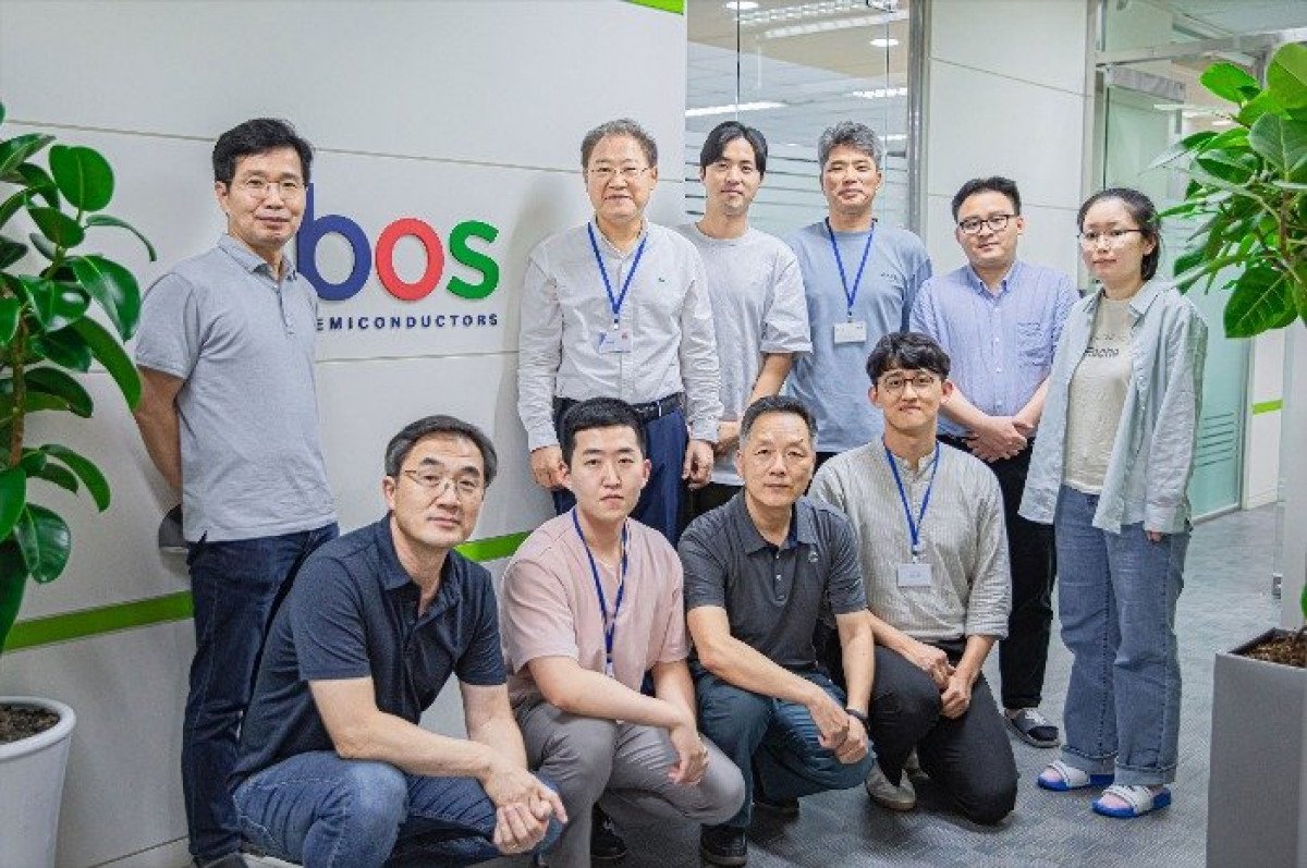 Bos Semiconductors engineering team posing at company office in South Korea, highlighting innovation and talent in the semiconductor technology industry.