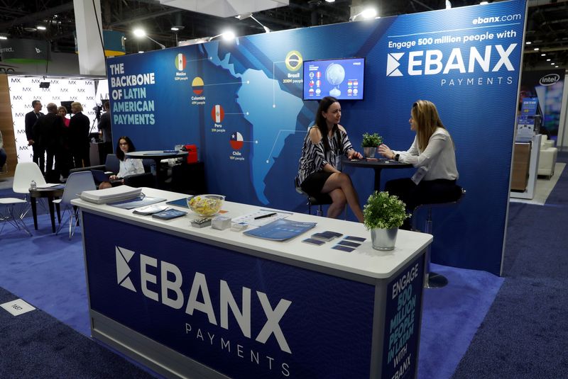 EBANX payments booth at a fintech trade show, showcasing Latin American digital payment solutions and cross-border commerce services.