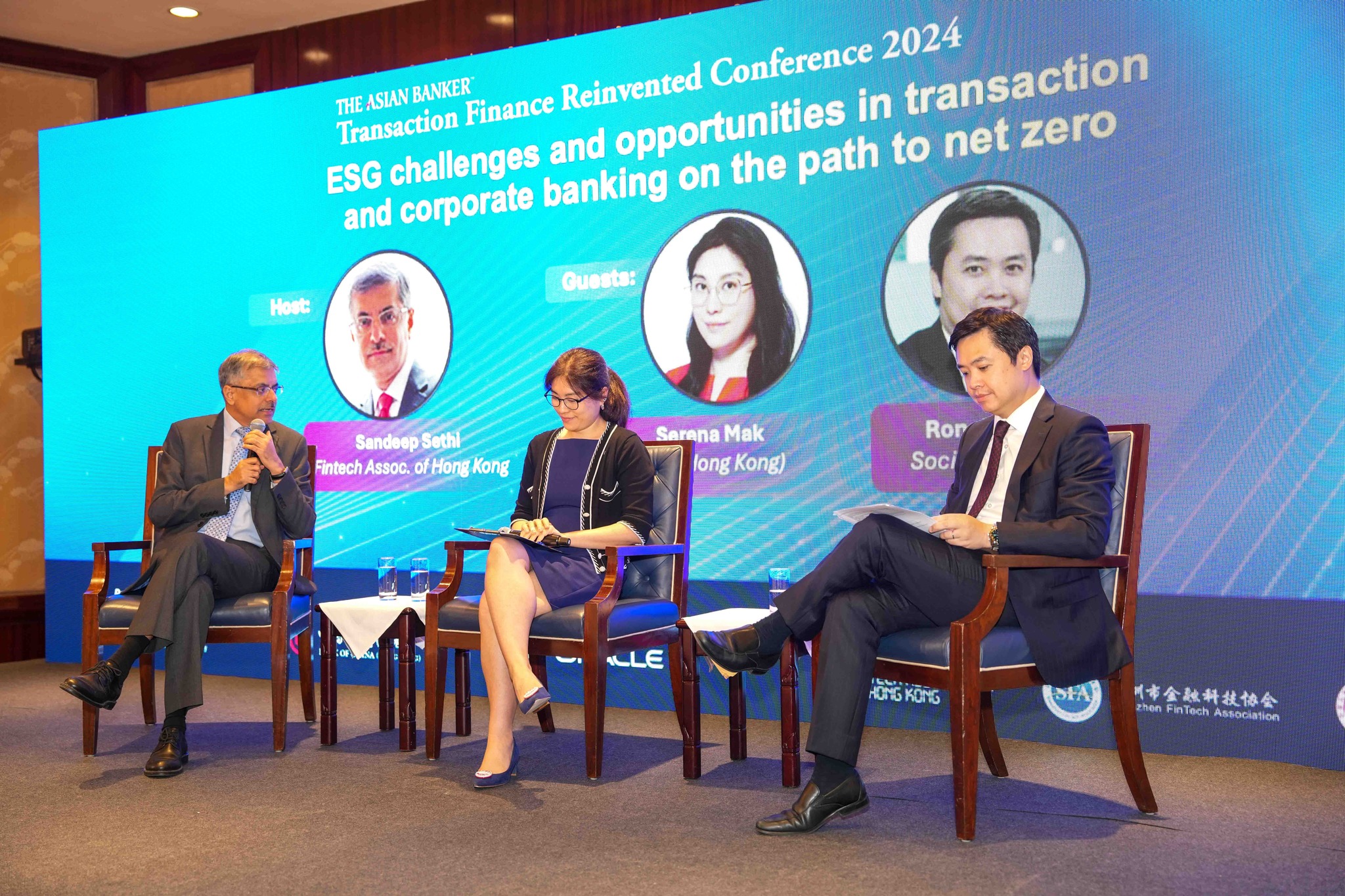 Industry experts speaking at The Asian Banker Transaction Finance Reinvented Conference 2024, discussing ESG challenges, sustainable finance opportunities, and corporate banking strategies for achieving net-zero goals.